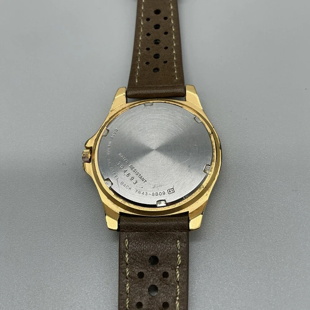 Vintage Seiko 7N43-8B09 Mens Watch 38mm Green Dial Day Date Brown Leather Quartz